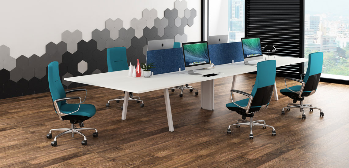 Green Liven medium back office chairs complement a back-to-back benching setup. 