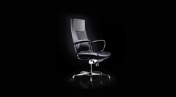 Medium back of Liven office chair in black leather. Chrome aluminium base.